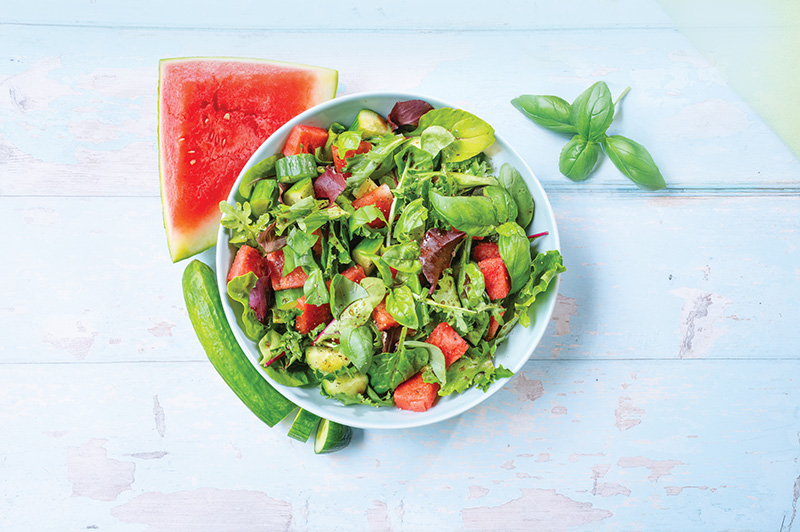Bowl of Watermelon Basil Salad with Honey Balsamic Dressing