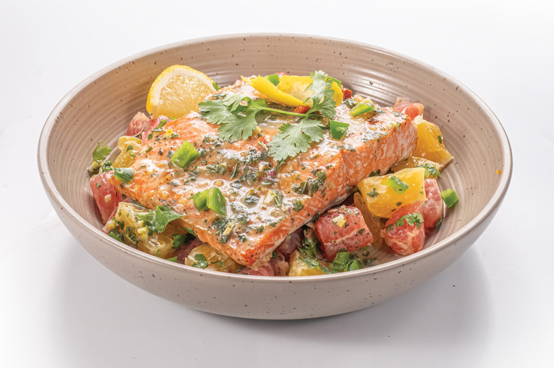 Winter Citrus Salmon with Herb Butter in a bowl